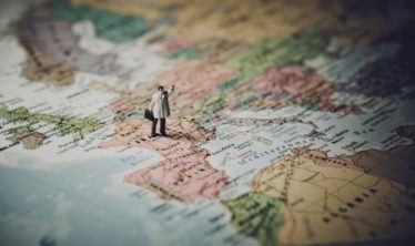 man-on-map-senior-air-travel