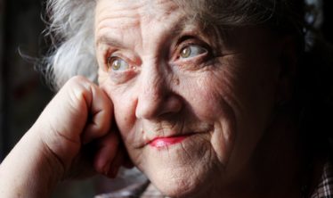 Elderly woman thinking